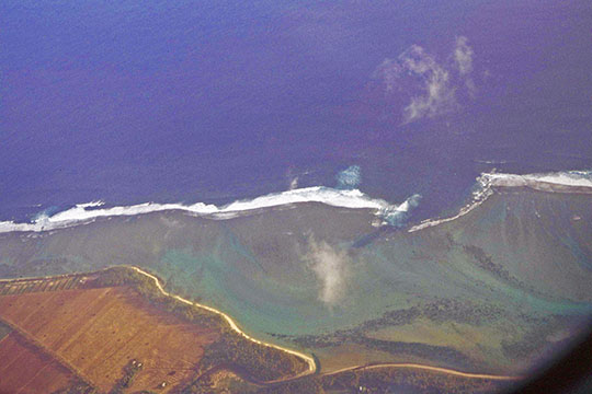 Flying over Bel Ombre on the south shore, right before landing in Mahebourg 1992 
 Except for a few houses, the area is quite undisturbed