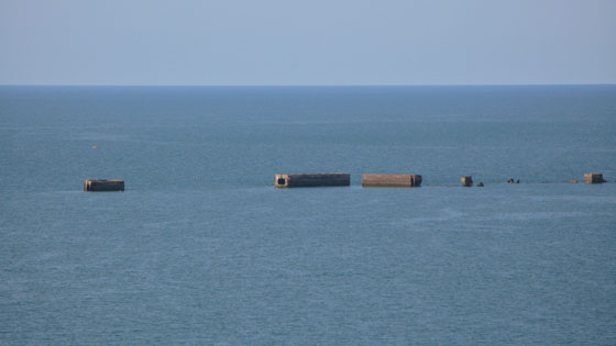 A few remaining Phoenix breakwaters off the shore of Arromanches