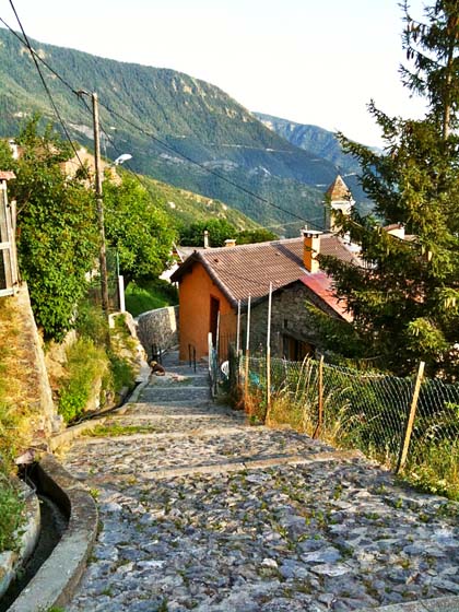 A cute paved pedestrian street down the village